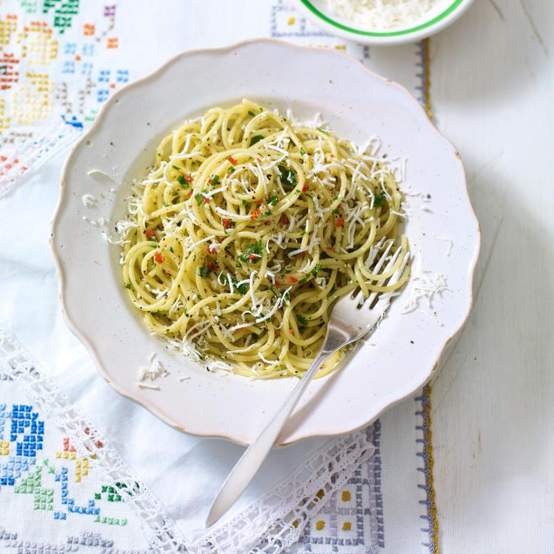 A plate of pasta seasoned with herbs and spices