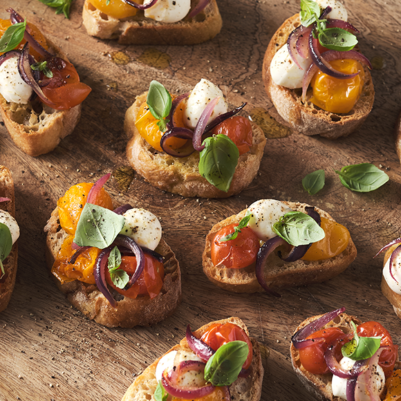Bruschetta with mozzarella and vegetables.